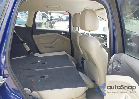 2014 Ford Escape Titanium z USA, uszkodzony, nr VIN 1FMCU9JX4EUA04520